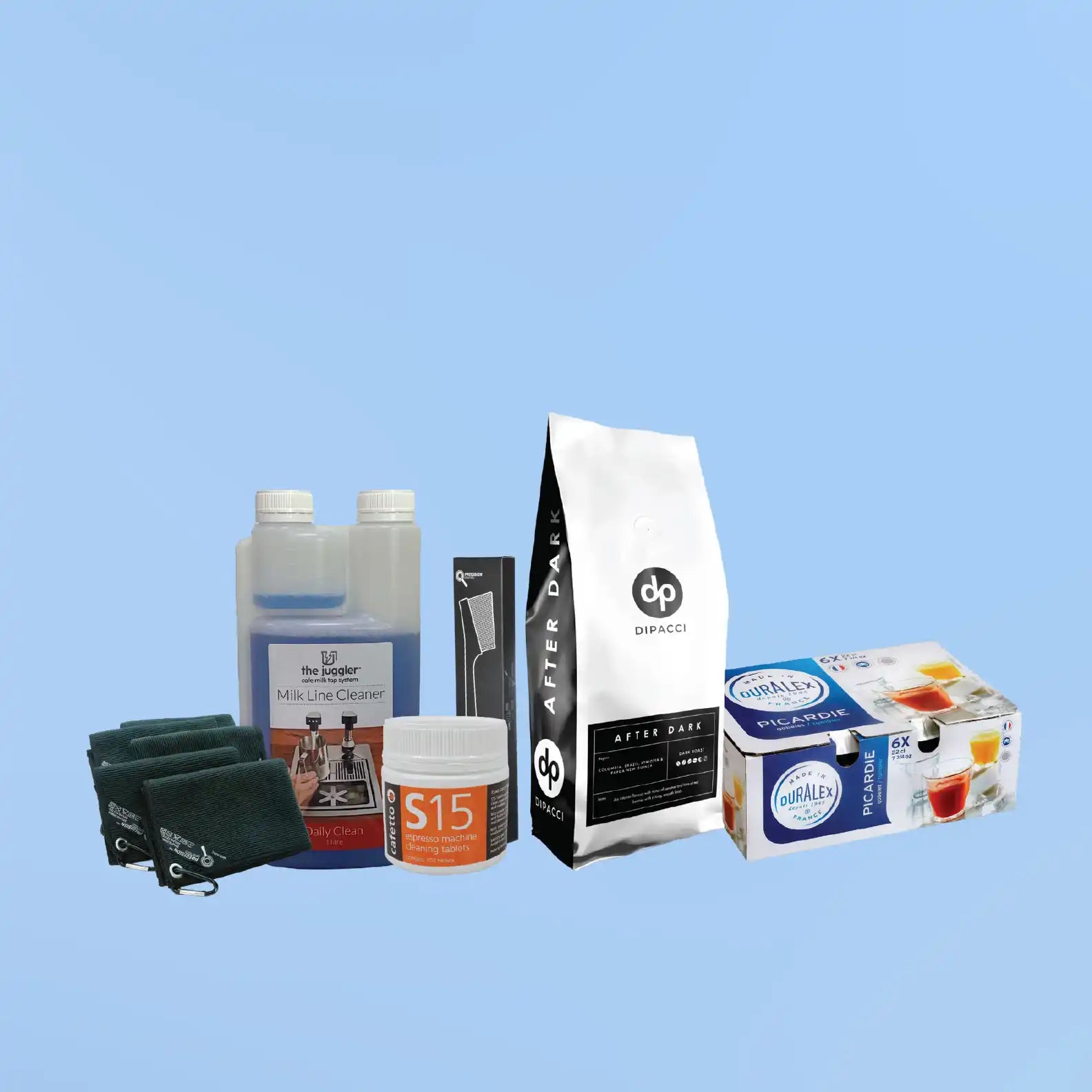Collection of coffee supplies and accessories including filters, beans, and cleaning products.