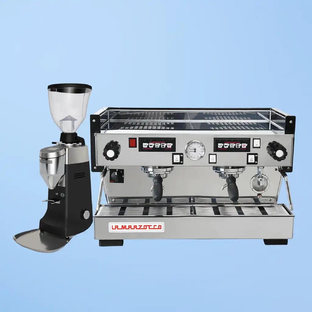 Professional espresso machine with dual group heads and an accompanying coffee grinder.